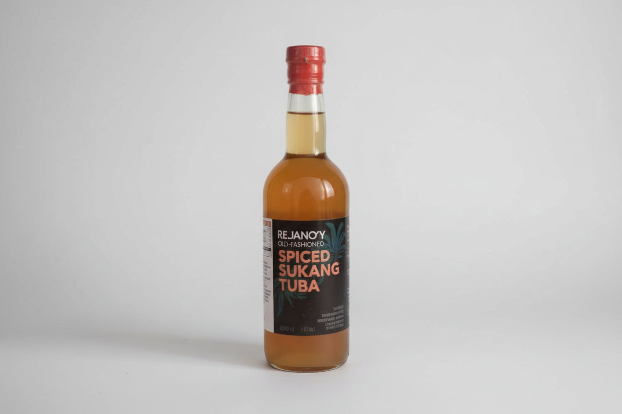 Bottle of rum with a red cap on a white background