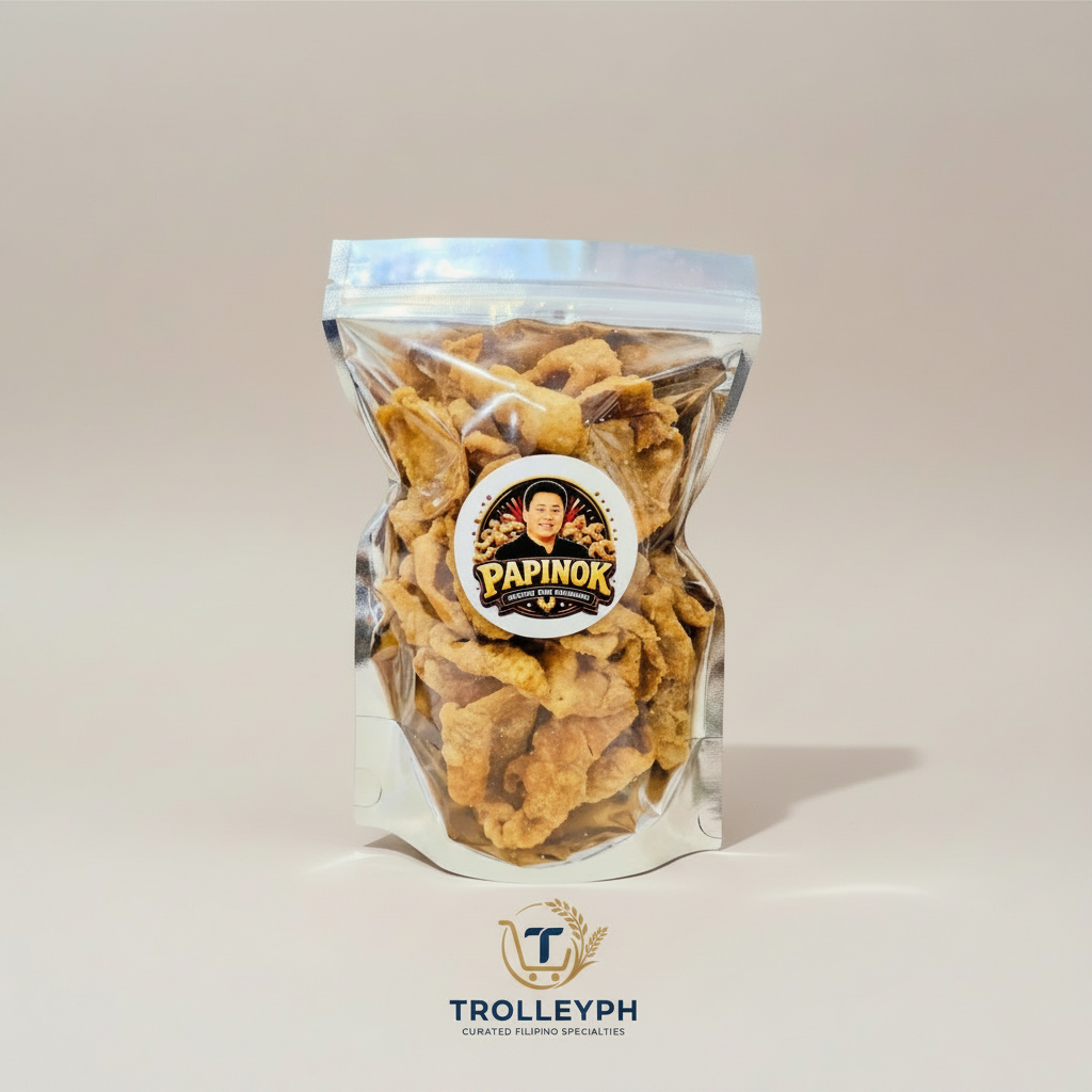 Papinok Chicken Skin Crackling 100g pouch of golden crispy chicken skin with the TrolleyPH logo beneath